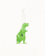 A green dinosaur-shaped air freshener or car air freshener with a white hanging string, shown against a plain white background.