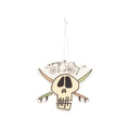 A skull-shaped hanging ornament with crossed swords behind it and the word 'JUSH' above, shown on a plain white background.