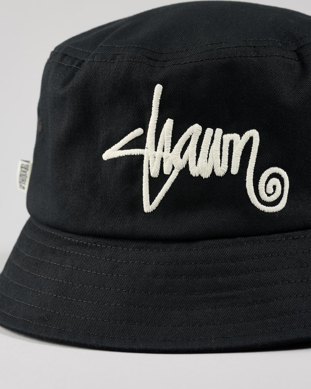 S DOUBLE SHAWN SCRIPT BUCKET HAT