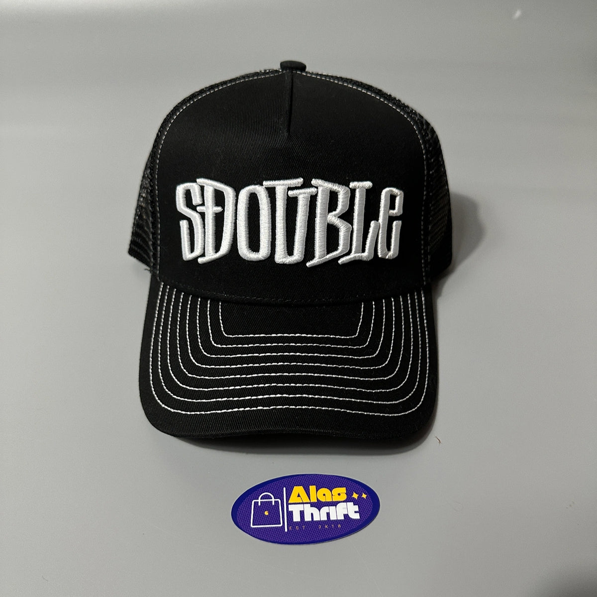 S DOUBLE MID-BLOCK CURVED PEAK TRUCKER HAT